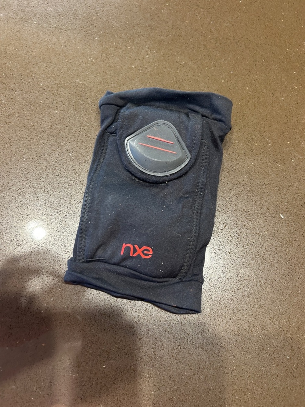 nxe Black arm Sleeve for small phone with Red Logo